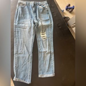 Distressed blue jeans